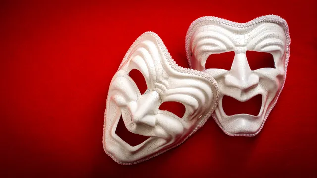 Here's an alt tag for the image: Comedy and tragedy masks.